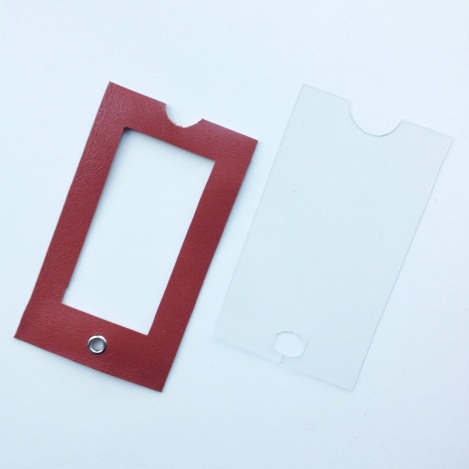 Cut out a rectangle of stiff plastic